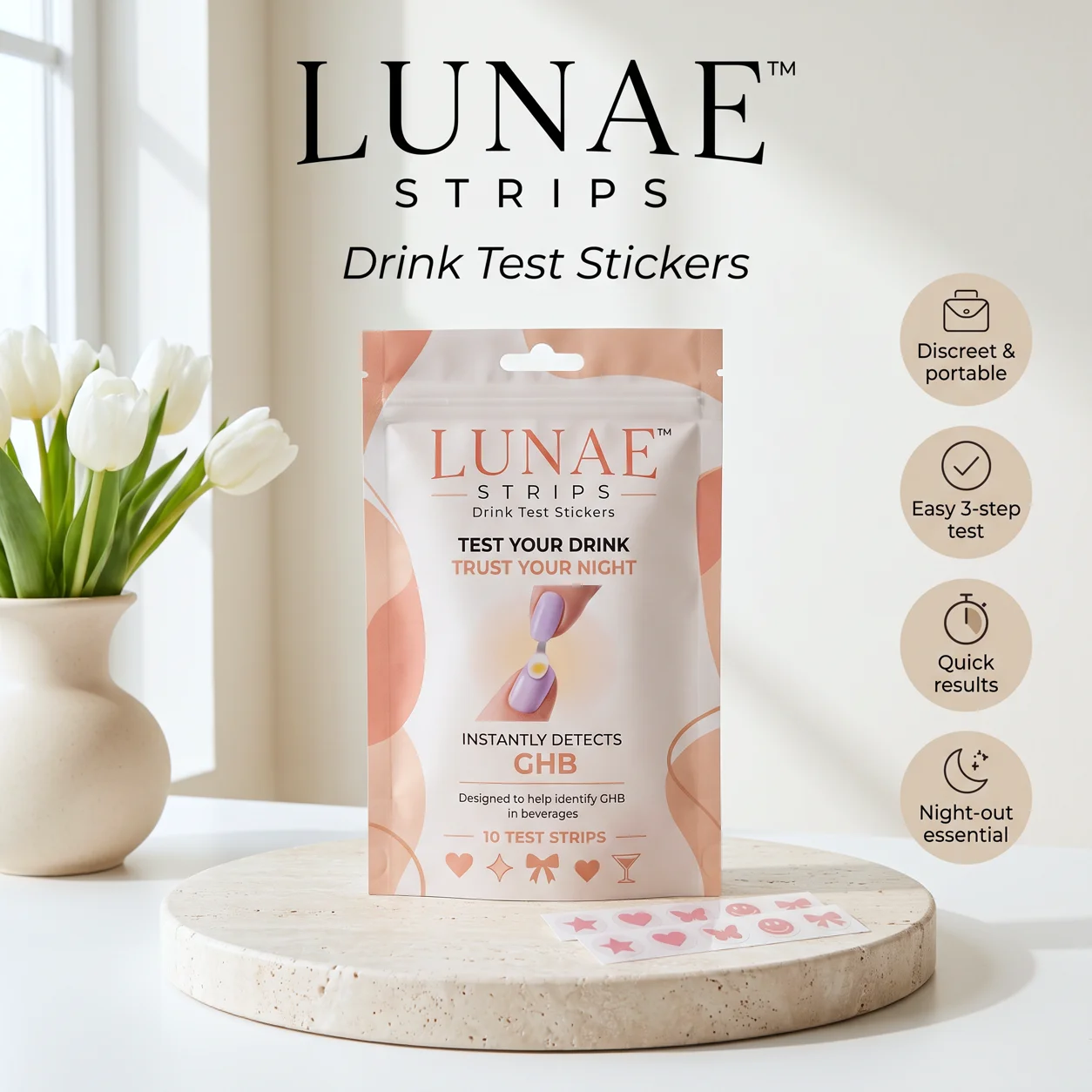 LUNAE Drink Test Stickers pouch on a stone pedestal